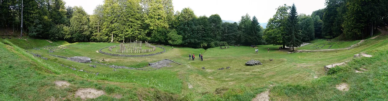 Sarmizegetusa Regia sanctuaries in a clearing surrounded by forest