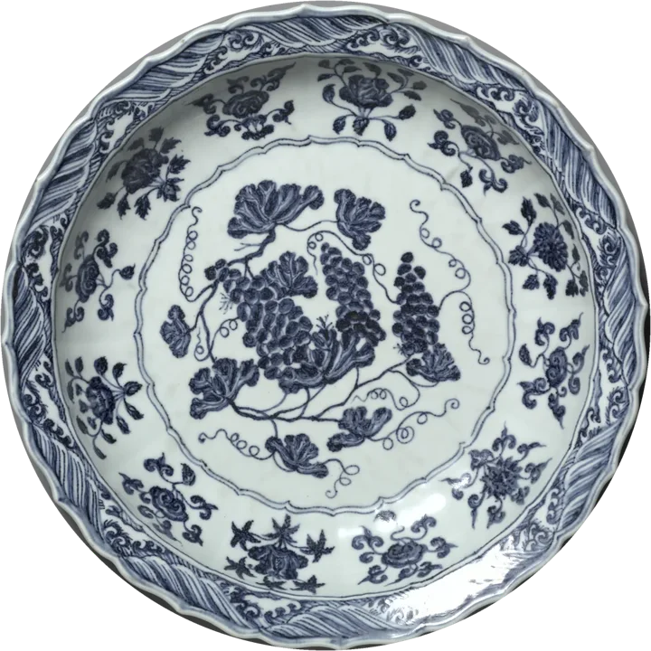 A white Chinese porcelain plate with blue grapes and floral sprays