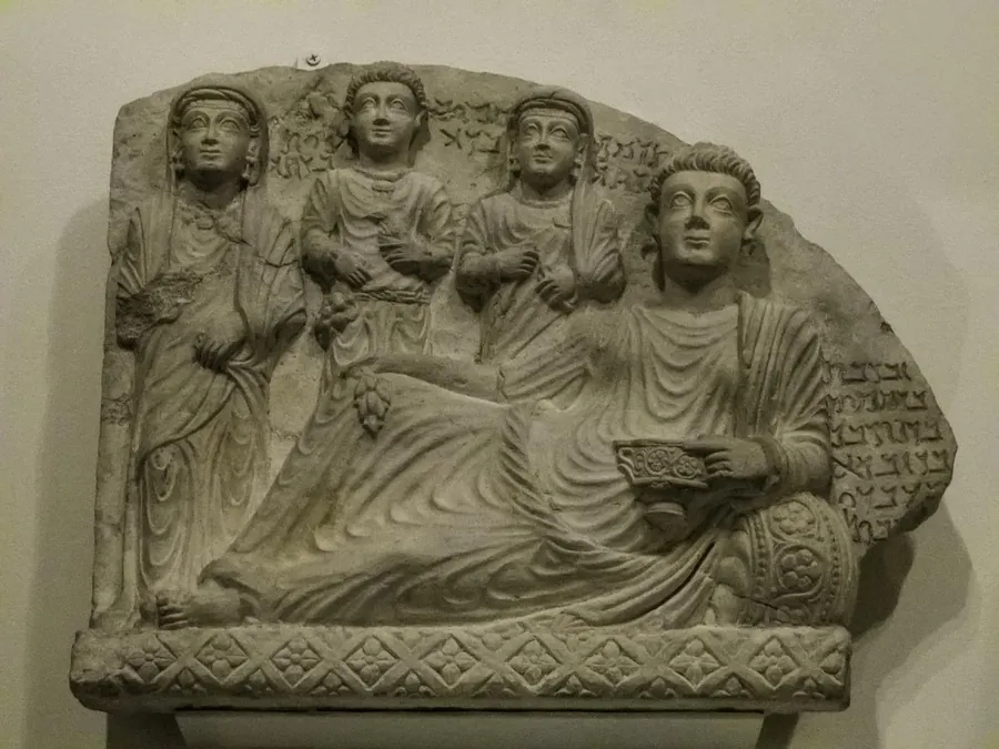 Palmyrene funerary stele with a banquet scene