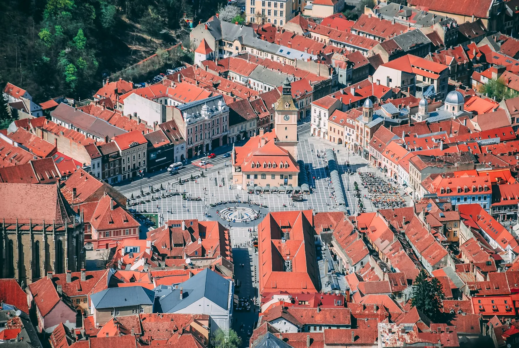 Aerial view: Council Square with the Council House in the middle, surrounded by houses with red roofs
