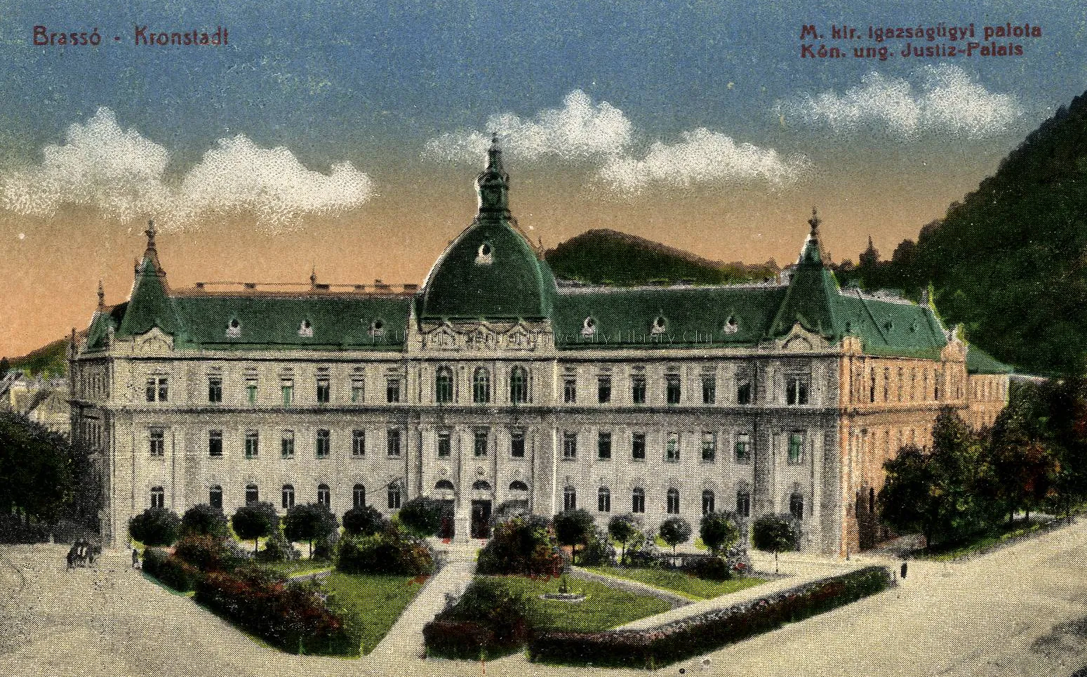 Carte poștală color: palat lung cu acoperiș verde și cupolă, cu o grădină în față
