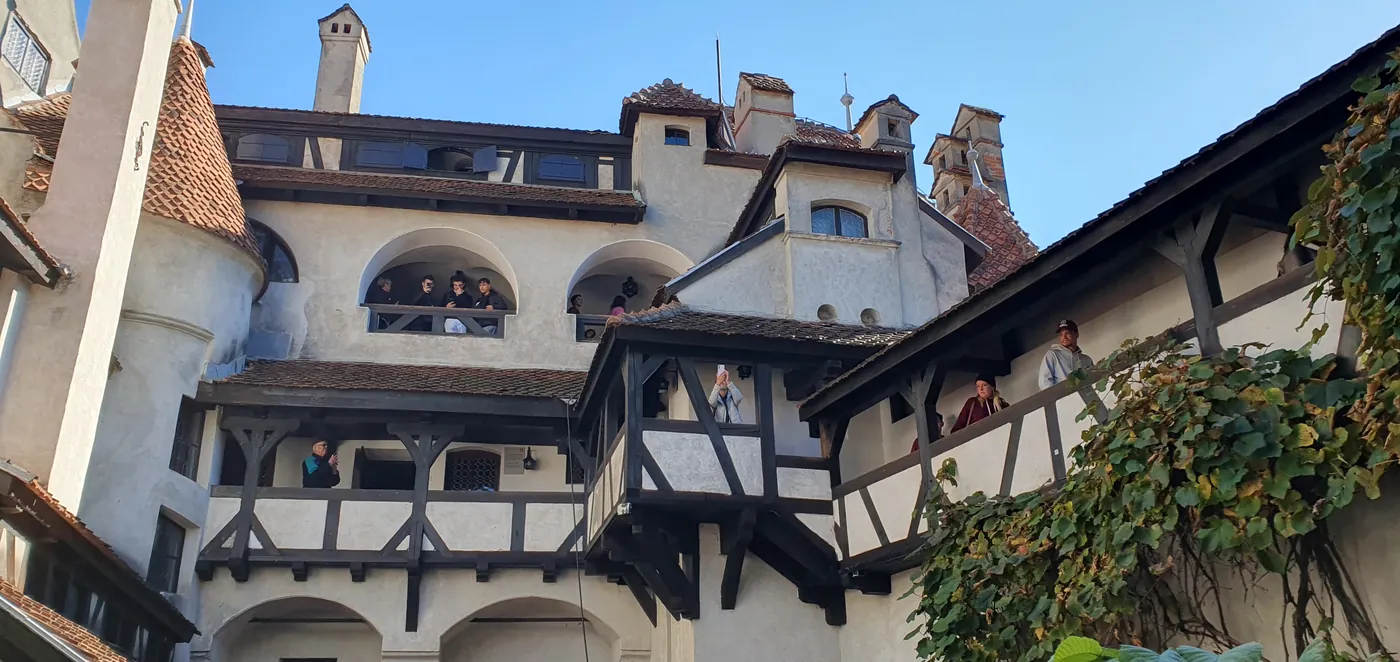 The castle's inner courtyard, with the wooden balconies of Queen Marie's time.