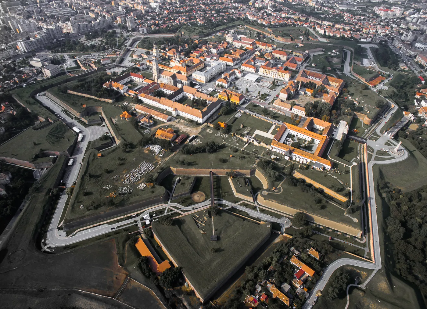 Alba Carolina fortress seen from above: the seven-bastion star ringed with green.