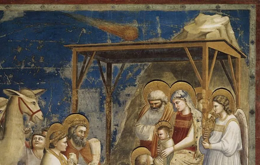 Detail of a fresco: a star with a fiery tail above the stable roof.