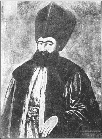 Portret al lui Dinicu Golescu: bărbat cu barbă neagră, în haine boierești de croială turcească și cu căciulă înaltă de blană.