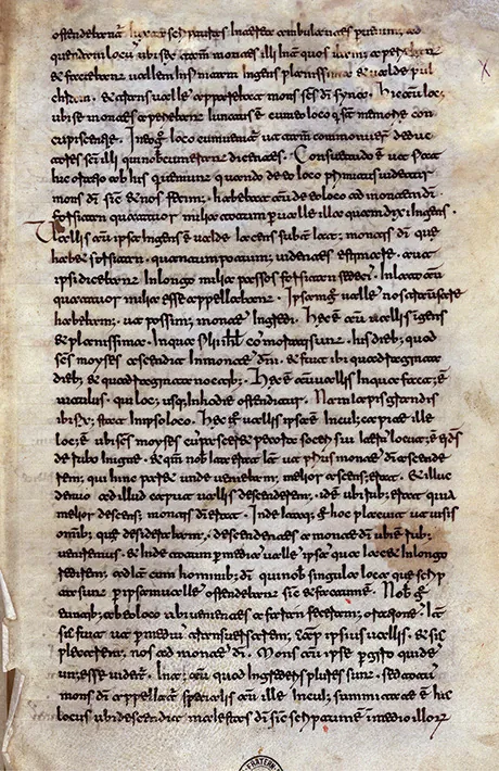 A page of a medieval manuscript in small brown script on yellowed parchment.