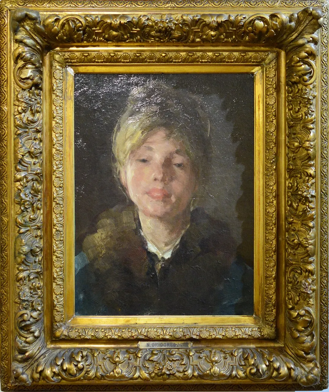 Portret de femeie de Nicolae Grigorescu, în ramă aurită