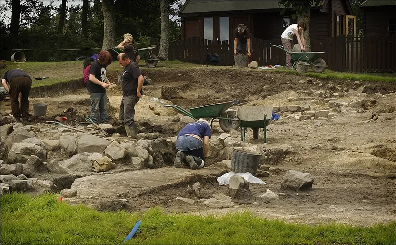 Archaeologists at work on the Vindolanda dig, between excavation trenches.