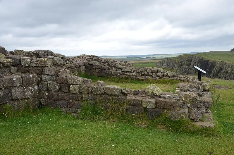 The turret at Walltown Crags: low Roman masonry on the ridge, valley landscape behind.