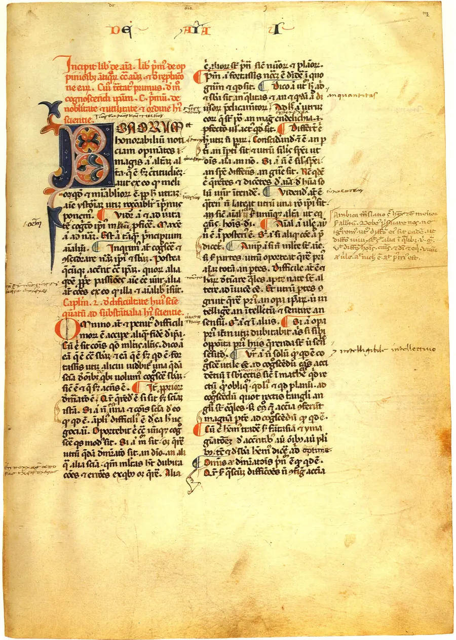 Page of a medieval Latin manuscript in two columns, with a decorated initial.