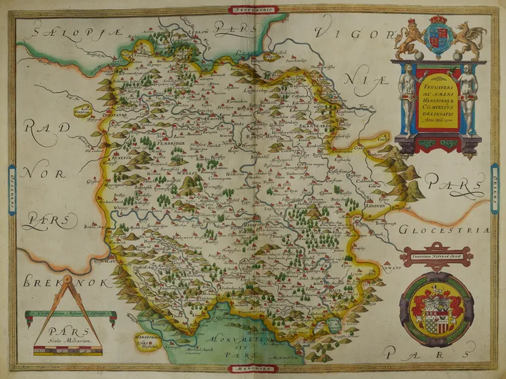 Engraved map of a border county, with hatched hills and an ornamented cartouche in the top right corner