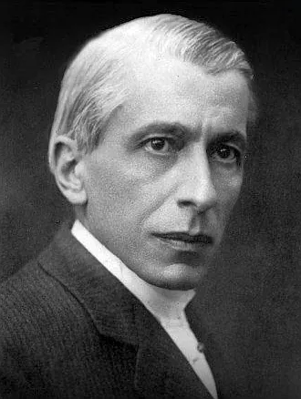 Portret fotografic al tânărului Nicolae Paulescu, cu mustață, în costum închis la culoare, privire spre stânga.