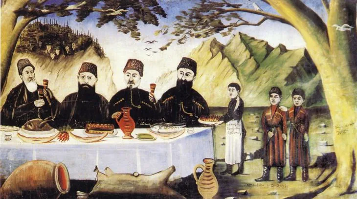 Ospăț georgian (Niko Pirosmani) — tamada urează „victorie!”.