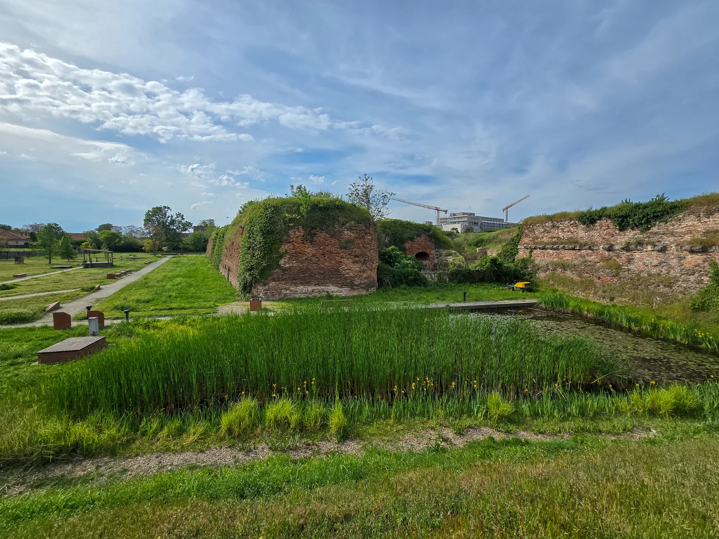 The Red bastion today, with brick walls and the reedy moat