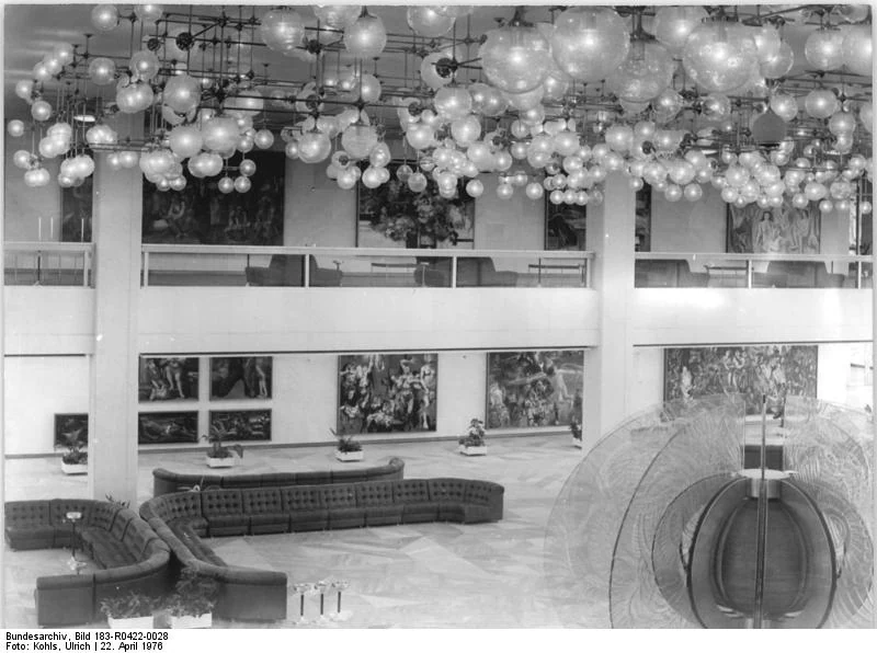 The Palast der Republik foyer photographed on 22 April 1976, with globe lights along the balconies.