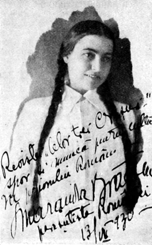 Black-and-white photograph from 1930: a young woman with two long braids, smiling faintly, with a long signed dedication across the image.