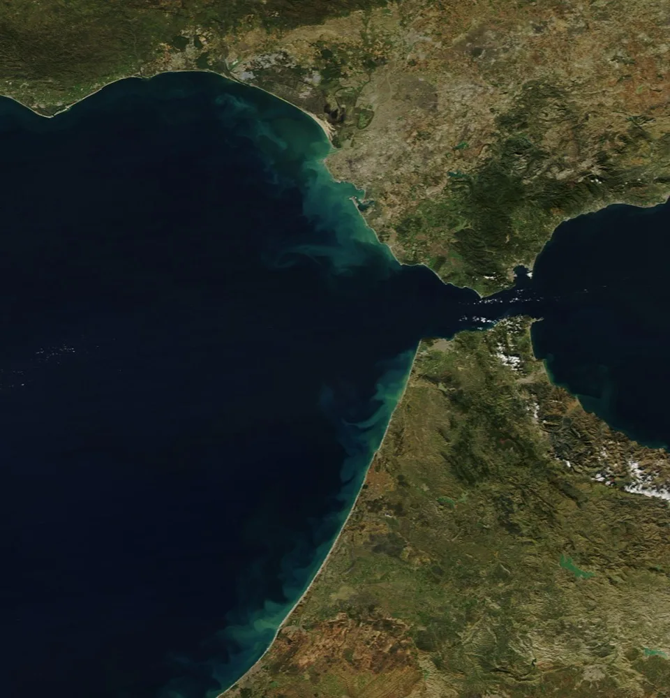 Satellite view of the Strait of Gibraltar: the Atlantic on the left, the Mediterranean on the right, Spain to the north and Morocco to the south.