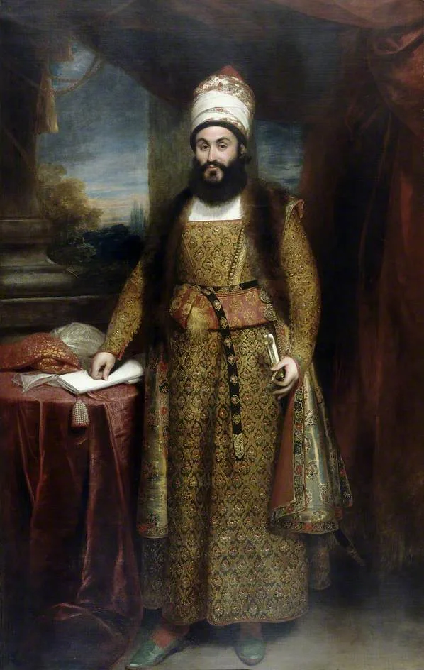 Mirza Abul Hassan Khan, portret în ulei de William Beechey, cu haină verde brodată și turban.